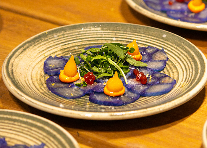 Foto oficial con chefs en escenario principal